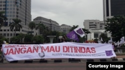 Sejumlah jurnalis saat mengikuti aksi May Day 2019. (Courtesy: Twitter AJI Indonesia)