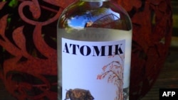 An undated handout photo received in London on August 8, 2019 from by The University of Portsmouth show a labelled bottle of 'ATOMIK' vodka. A team of British scientists has helped produce a radioactivity-free vodka called "ATOMIK" from crops near…