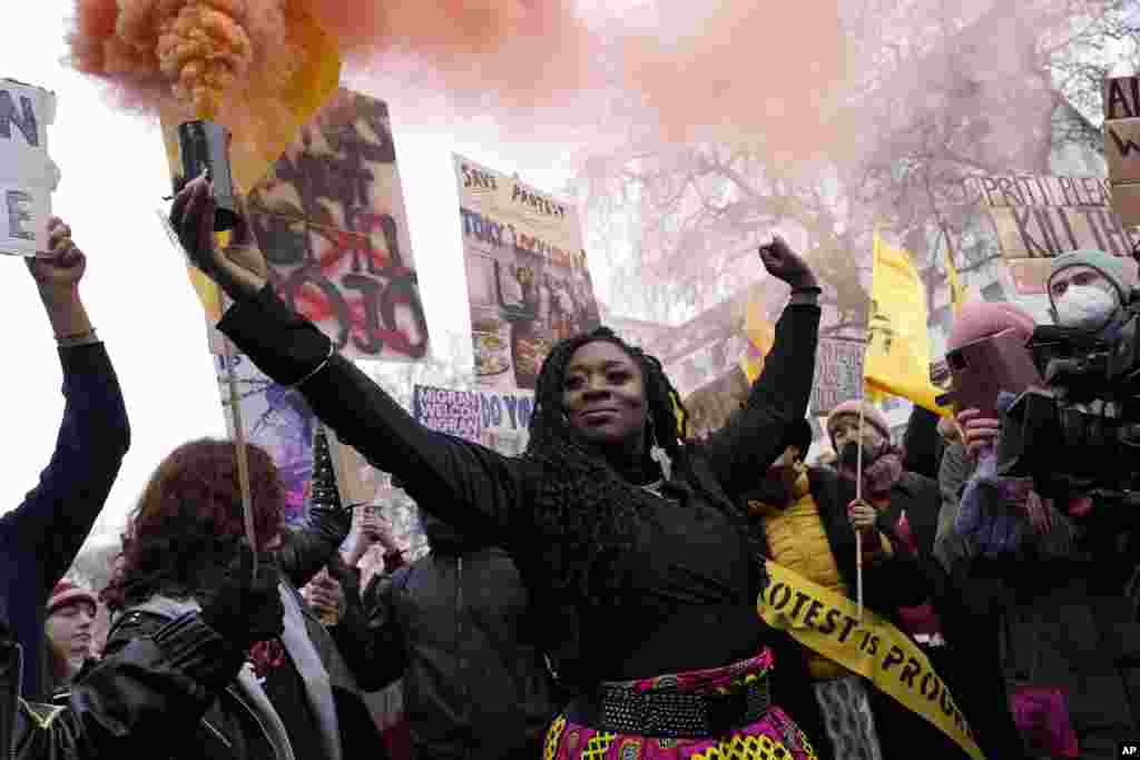 A protester holds a flare during the &#39;Kill the Bill&#39; march on the national day of action in London, Jan. 15, 2022.&nbsp;Protesters march in London, Bristol, Coventry, Newcastle, Liverpool, Sheffield, Plymouth and more ahead of the Lords&#39; final vote on the bill on Jan. 17.