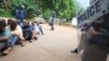 A policeman stands guard as some of the people arrested during demonstrations over the hike in fuel prices, make their court appearance at the magistrates courts in Harare, Jan,16, 2019. 