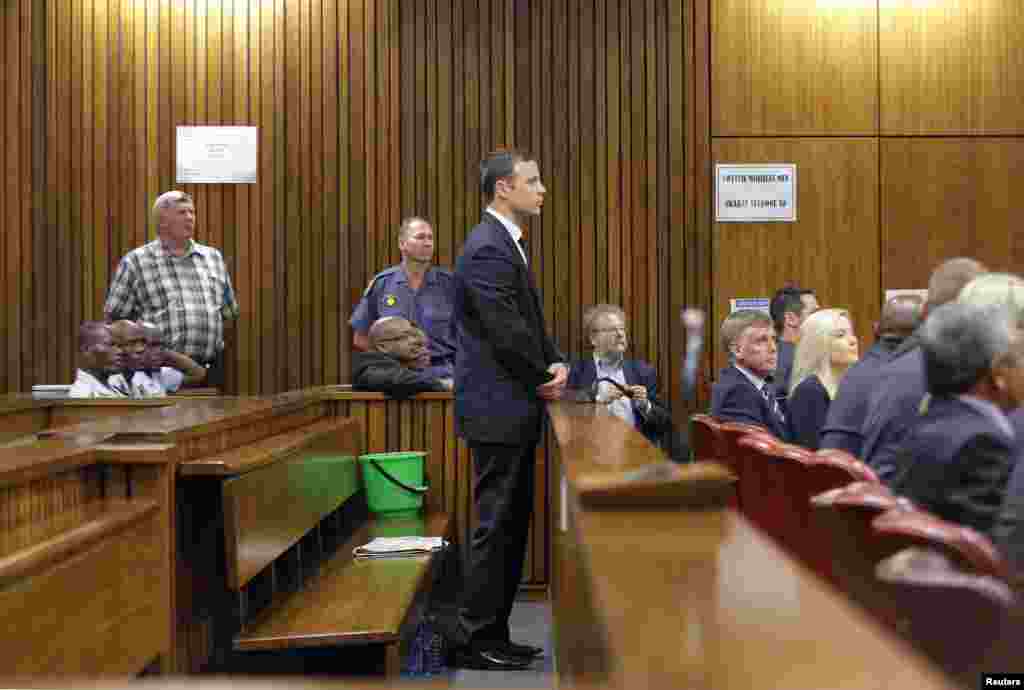 Oscar Pistorius stands in the dock at the North Gauteng High Court in Pretoria, Sept. 11, 2014.&nbsp;