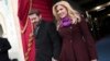 Singer Kelly Clarkson and Brandon Blackstock arrive on the West Front of the Capitol in Washington, Jan. 21, 2013, for the President Barack Obama's ceremonial swearing-in ceremony.