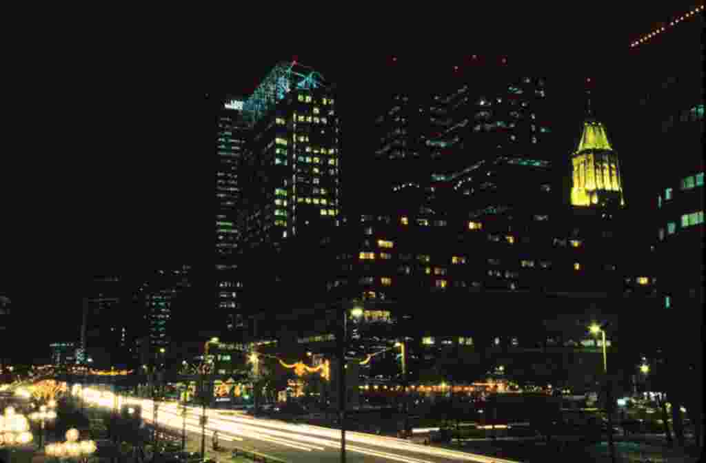 Hotels and office towers along Pratt Street, across from Harbor Place.