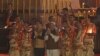 Japan's Prime Minister Shinzo Abe (front, 3rd L) and his Indian counterpart Narendra Modi perform a religious ritual during evening prayers on the banks of the river Ganges in Varanasi, India, December 12, 2015.