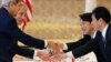 US, Japan Agree to Bolster Defenses 