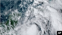 This satellite image provided by the National Oceanic and Atmospheric Administration shows Tropical Storm Zeta, Oct. 25, 2020, at 2110 GMT (5:10 p.m. ET). 
