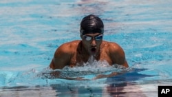 Ibrahim al-Hussein, saat latihan di Olympic Aquatic Centre, di Athena, Rabu, 30 Juni 2021. (AP)