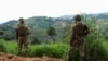 FILE - Members of the Armed Forces of the Democratic Republic of the Congo stand guard against the M23 rebel group in Lubero, North Kivu province, Oct. 27, 2024. The rebels have seized Masisi near the provincial capital Goma, local politicians said on Jan. 5, 2025.