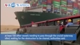 VOA60 Africa- Egypt: Suez Canal Blocked a Second Full Day