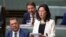 FILE - Gladys Liu, the first Chinese-born lawmaker to be elected to Australia's Parliament, addresses the House of Representatives in Canberra, Australia, July 25, 2019.