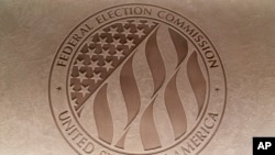 FILE - The Federal Election Commission emblem is seen at the FEC headquarters in Washington on Aug. 10, 2023. The FEC oversees election spending, including that of political action committees.