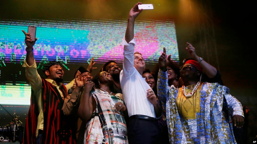 Image result for Macron at african shrine