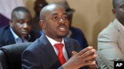 FILE - Opposition leader Nelson Chamisa addresses a media conference at party headquarters in Harare, Zimbabwe, Aug, 25, 2018. 