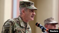 FILE - U.S. Army General John Nicholson speaks during a change of command ceremony in Resolute Support headquarters in Kabul, Afghanistan, March 2, 2016. 