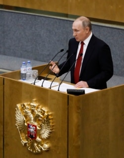 Russian President Vladimir Putin speaks a session prior to voting for constitutional amendments at the State Duma, the Lower House of the Russian Parliament in Moscow, March 10, 2020.