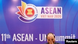 FILE - Vietnam's Prime Minister Nguyen Xuan Phuc attends the 11th ASEAN - UN summit, as part of the 37th ASEAN Summit in Hanoi, Vietnam, Nov. 15, 2020. 