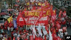 A huge banner in support of Mary Jane Veloso, a Filipino convicted drug trafficker who was spared from execution by firing squad in Indonesia, May 1, 2015.