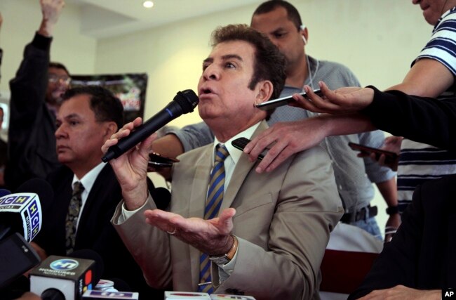 FILE - Honduran presidential candidate Salvador Nasralla holds a press conference in Tegucigalpa, Honduras, Dec. 22, 2017.