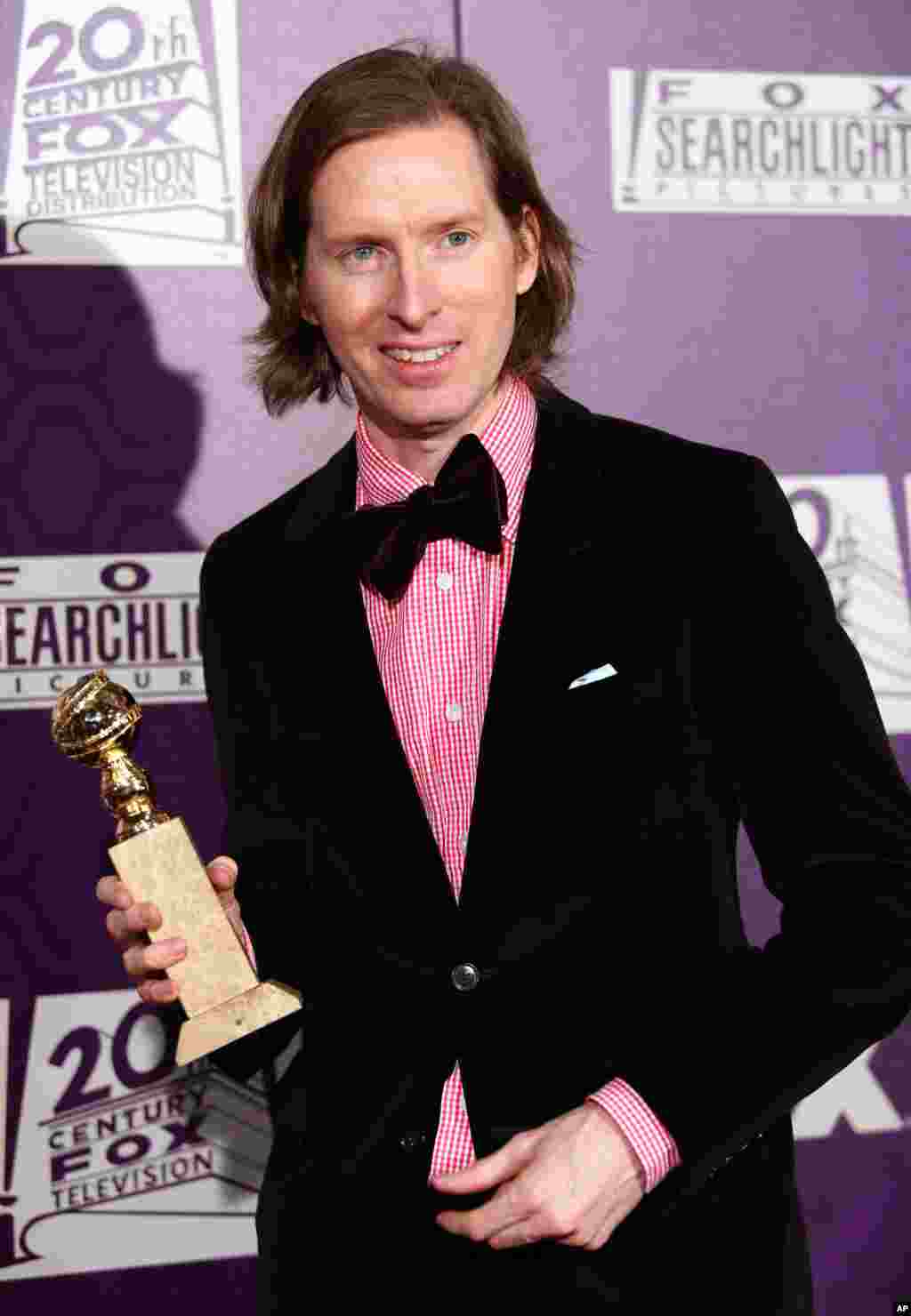 Wes Anderson, winner of best motion picture - comedy or musical for "The Grand Budapest Hotel", arrives at the Fox Searchlight Golden Globes afterparty at the Beverly Hilton Hotel, Jan. 11, 2015, in Beverly Hills, Calif.