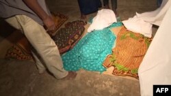 This video grab obtained by AFPTV from TVM on April 8, 2024 shows the bodies recovered after a boat sank off the north coast of Mozambique killing 96 people, on the Island of Mozambique.