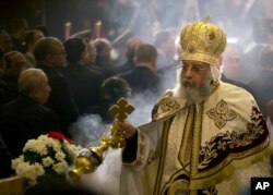 Coptic Pope Tawadros II leads Christmas Eve Mass at St. Mark's Cathedral, in Cairo, Egypt, Jan. 6, 2017.