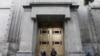 FILE - Security officials stand outside the main entrance to Mexico's Supreme Court of Justice in Mexico City, Mexico August 19, 2024. 