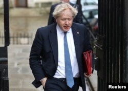 Britain's Foreign Minister Boris Johnson arrives in Downing Street for a meeting of the government's special COBRA committee in London, March 7, 2018.
