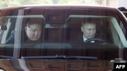 Kim i Putin u limuzini (Photo by Gavriil GRIGOROV / POOL / AFP)
