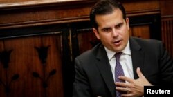 FILE - Puerto Rico Governor Ricardo Rossello speaks during an interview in New York City, Nov. 2, 2017.