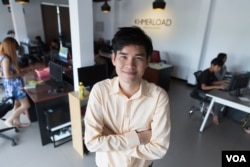 In Vichet, CEO of Khmerload.com website and Cambodia's successful online shopping business Little Fashion, stands at his office in Phnom Penh, Cambodia on March 24, 2017. (Neou Vannarin/VOA Khmer)