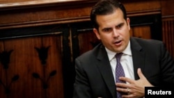 FILE - Puerto Rico Governor Ricardo Rossello speaks during an interview in New York City, Nov. 2, 2017.