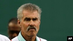 FILE - Former Boston Red Sox's player Bill Buckner prior to a baseball game against the Colorado Rockies in Boston, May 25, 2016. 
