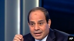 In this image made from video broadcast on Egypt's State Television, Egypt's retired Field Marshal Abdel-Fattah el-Sissi listens to a question during an interview in a nationally televised program in Cairo, Egypt, May 5, 2014.
