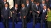 China&#39;s President Xi Jinping, U.N. Secretary-General Ban Ki-moon, U.S. President Barack Obama, Netherlands&#39; P.M. Mark Rutte, Kazakhstan&#39;s President Nursultan Nazarbayev and South Korea&#39;s President Park Geun-hye (L-R) take part in a photo with other world leaders at the Nuclear Security Summit in The Hague, March 25, 2014.