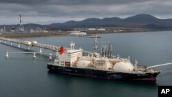 File - the tanker sun arrows loads its cargo of liquefied natural gas from the sakhalin-2 project in the port of prigorodnoye, russia, on oct. 29, 2021.