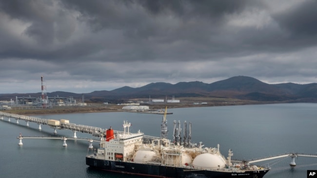 FILE - The tanker Sun Arrows loads its cargo of liquefied natural gas from the Sakhalin-2 project in the port of Prigorodnoye, Russia, on Oct. 29, 2021.