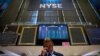 A trader works on the floor of the New York Stock Exchange (NYSE) in New York, Aug. 28, 2018. 