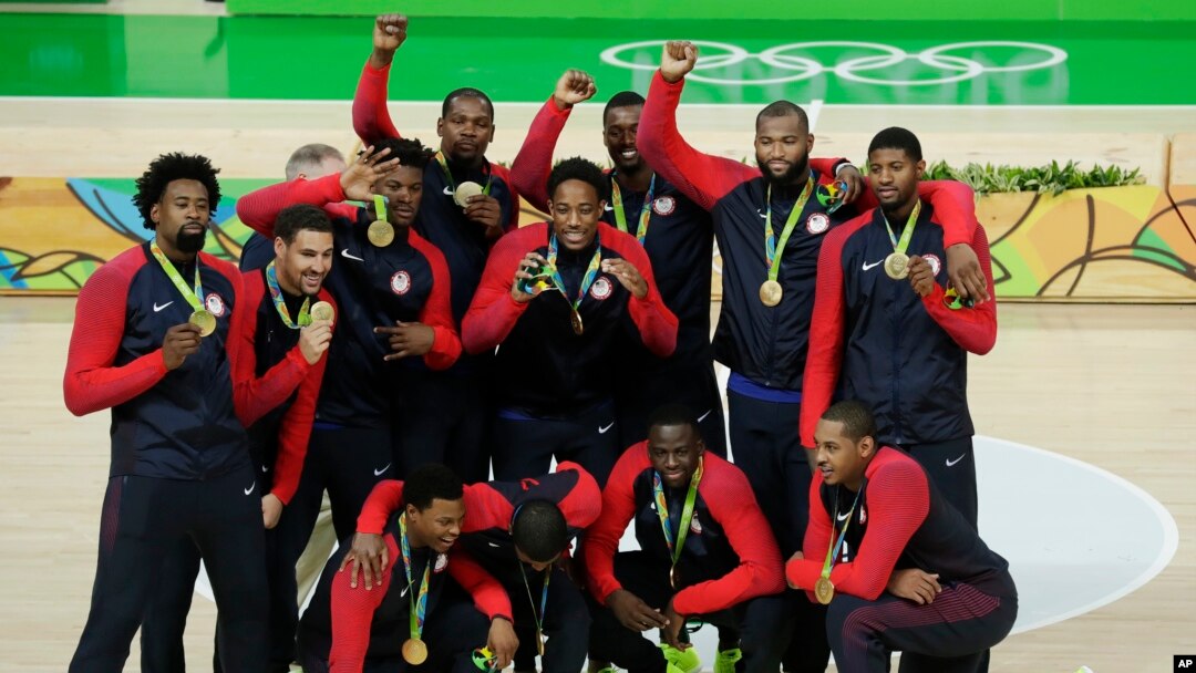 Rio Olympics Basketball Men: The United States' basketball team poses with their gold medals at the 2016 Summer Olympics in Rio de Janeiro, Brazil, Aug. 21, 2016. 