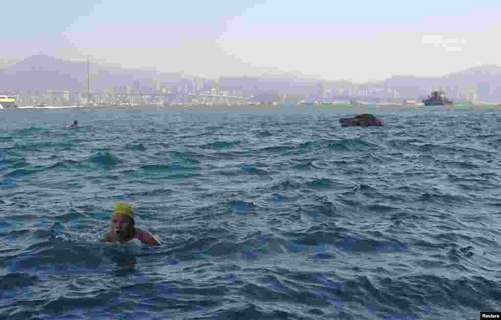 Miao Rong Lu, 68, swims in the sea at the Sai Wan Swimming Shed in Hong Kong, China, October 5, 2018.