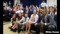 President Barack Obama and staff watch the U.S. soccer team vs Belgium in World Cup action in the Eisenhower Executive Office Building South Court Auditorium, July 1, 2014. (Official White House Photo by Pete Souza)