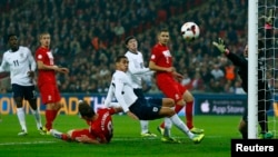 England played against Poland during their 2014 World Cup qualifying soccer match at Wembley Stadium in London October 15, 2013. 