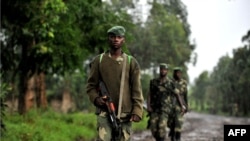 Des rebelles du M23 en patrouille à Rangira, près ed Rutshuru, en octobre 2012