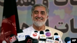 Afghan presidential candidate Abdullah Abdullah speaks during a news conference in Kabul, Afghanistan, Wednesday, May 14, 2014.