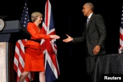 Britain's Prime Minister Theresa May (L) and U.S. President Barack Obama shake hands after speaking to reporters following their bilateral meeting alongside the G20 Summit, in Ming Yuan Hall at Westlake Statehouse in Hangzhou, China, September 4, 2016.