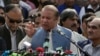FILE - Nawaz Sharif addresses a crowd during his visit to a mausoleum of Pakistani poet Mohammad Iqbal on the occasion of Pakistan Independence Day in Lahore, Aug. 14, 2017.