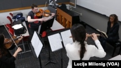 UNLV international student Anastasia Motiti leads a group of fellow musicians in a practice performance.