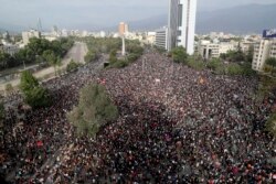 Demonstrators protest against the government in Santiago, Chile, Nov. 4, 2019. Chile has been facing weeks of unrest, triggered by a relatively minor increase in subway fares.