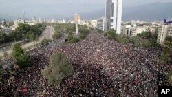 Demonstrators protest against the government in Santiago, Chile, Nov. 4, 2019. Chile has been facing weeks of unrest, triggered by a relatively minor increase in subway fares. 