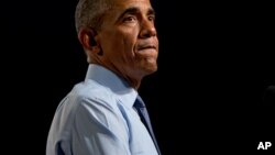 Presiden AS Barack Obama memberikan sambutan di Macomb Community College (9/9) di Warren, Michigan. (AP/Andrew Harnik)