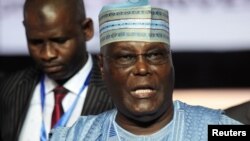 FILE - Atiku Abubakar, a former vice president, attends the national convention of Nigeria's opposition People's Democratic Party, in the southern city of Port Harcourt in the Niger Delta, Nigeria, Oct. 6, 2018. 